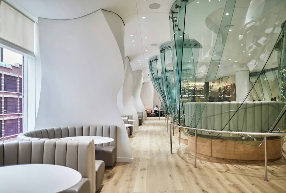 Renovated cafe with Gehry's undulating glass booths