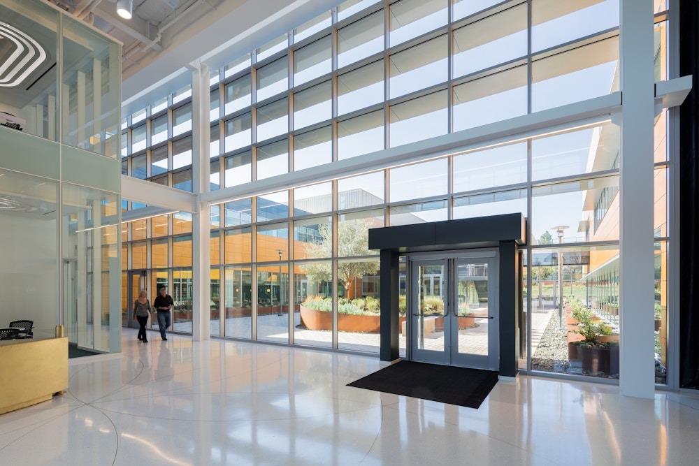 Double-height lobby feeds to the courtyard
