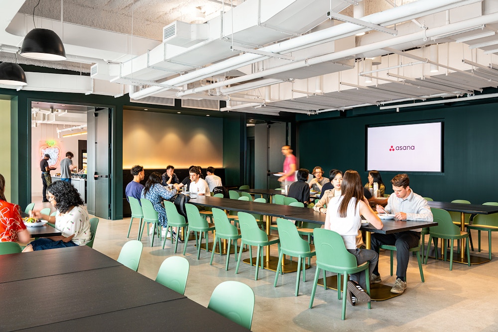 The dining room doubles as an all-hands space for internal presentations and events.