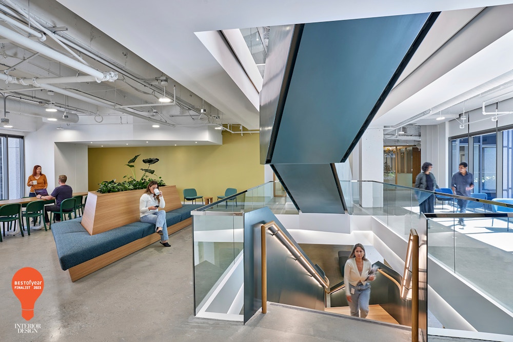 Social spaces that bring employees together are connected by a grand central stair at Chime.