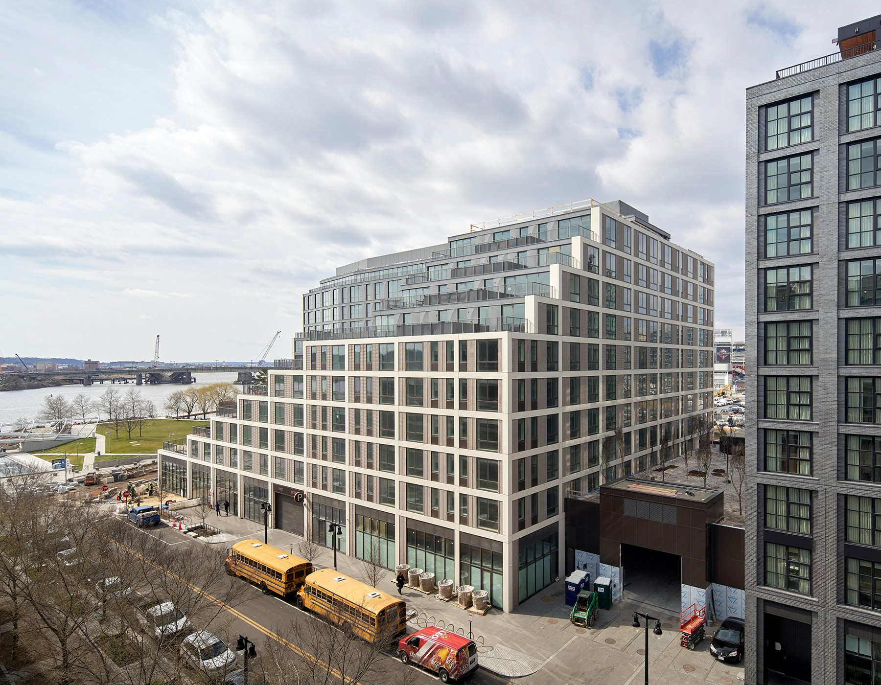 Cascading terraces overlooking Yards Park and the Anacostia River, adjacent to STUDIOS' Thompson Hotel