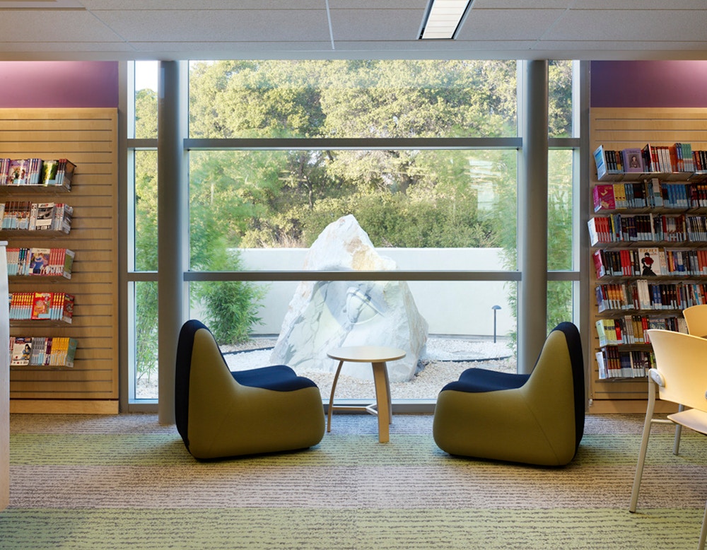 Reading nook with view out to sculpture garden