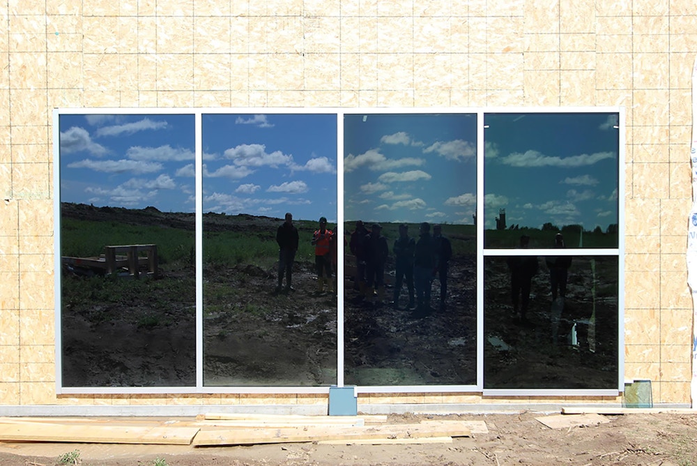 Full-size mockup showing EC glass panels in tinted state