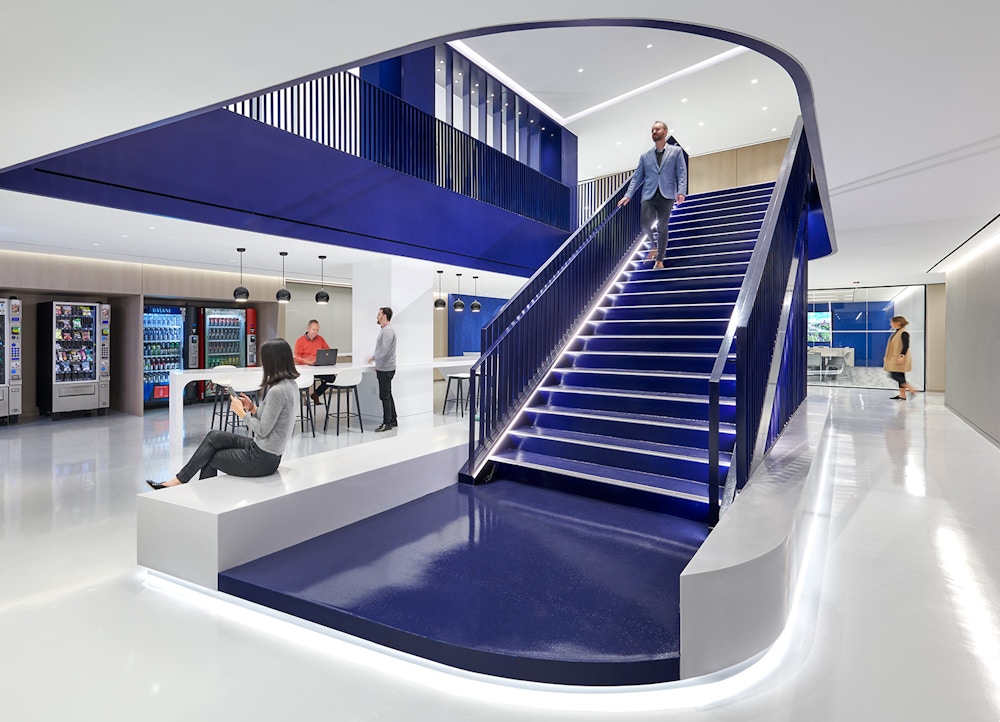 Grab-and-go bar at the lower level by central stair