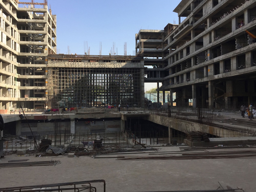 Construction photo view to entry cutout in north facade