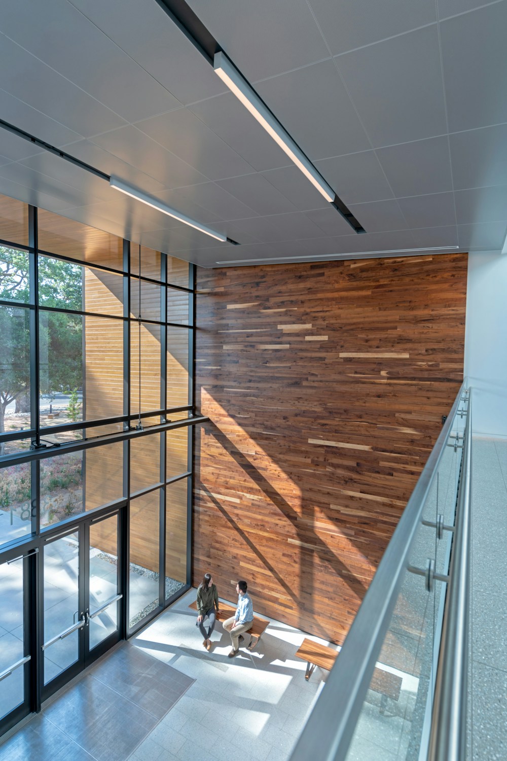 Double-height lobby with feature wall (Building 2)