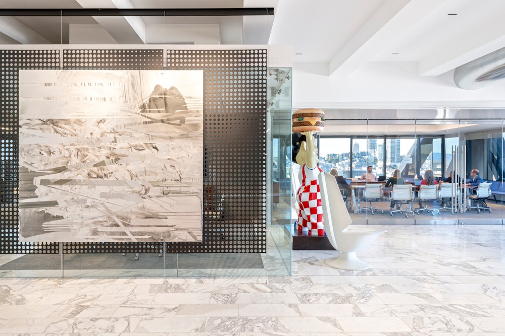 The large conference room features an operable glass Nana wall, opening out to the lobby for all-hands meetings and events.