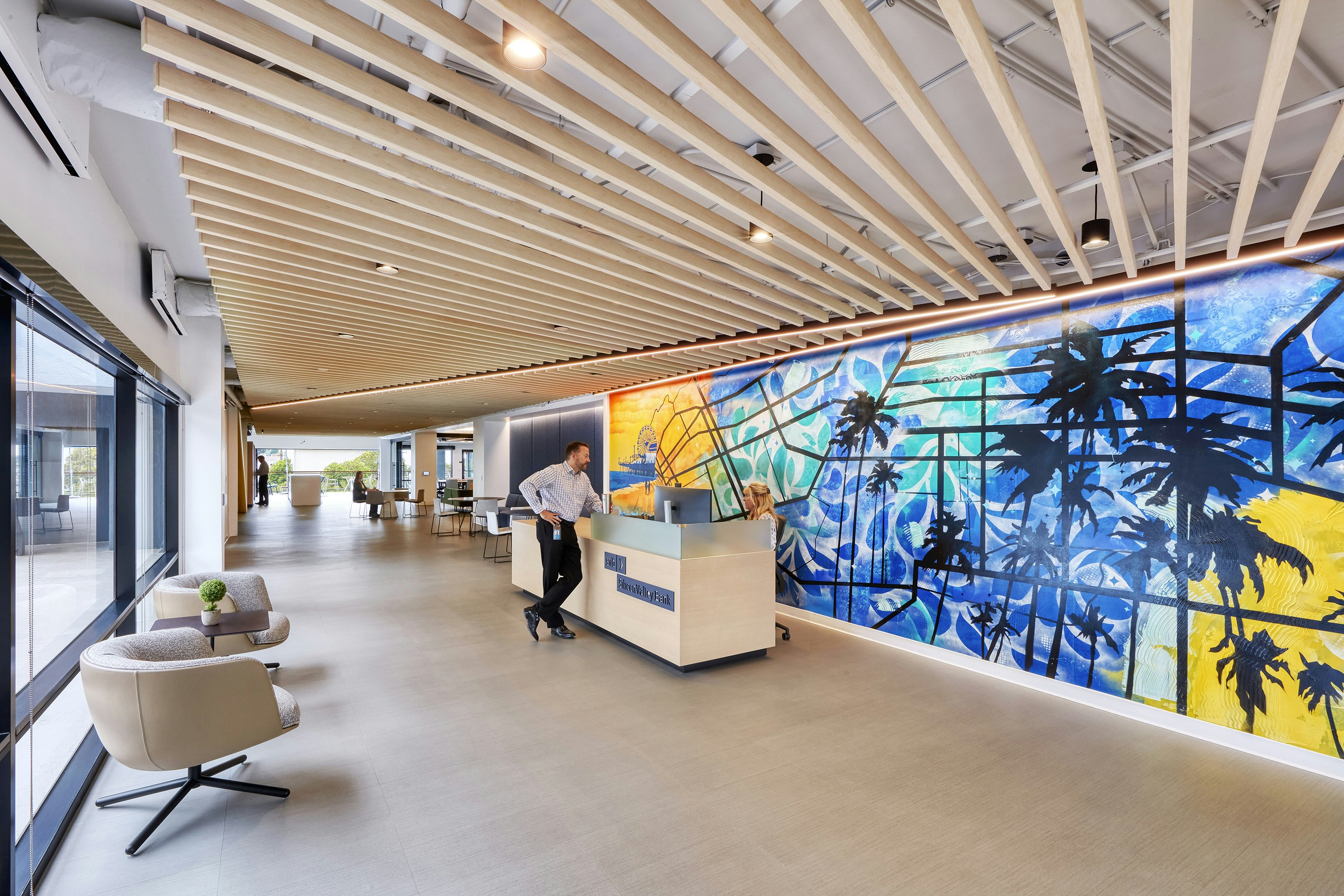 The main entrance and reception connects to the central open area and terrace