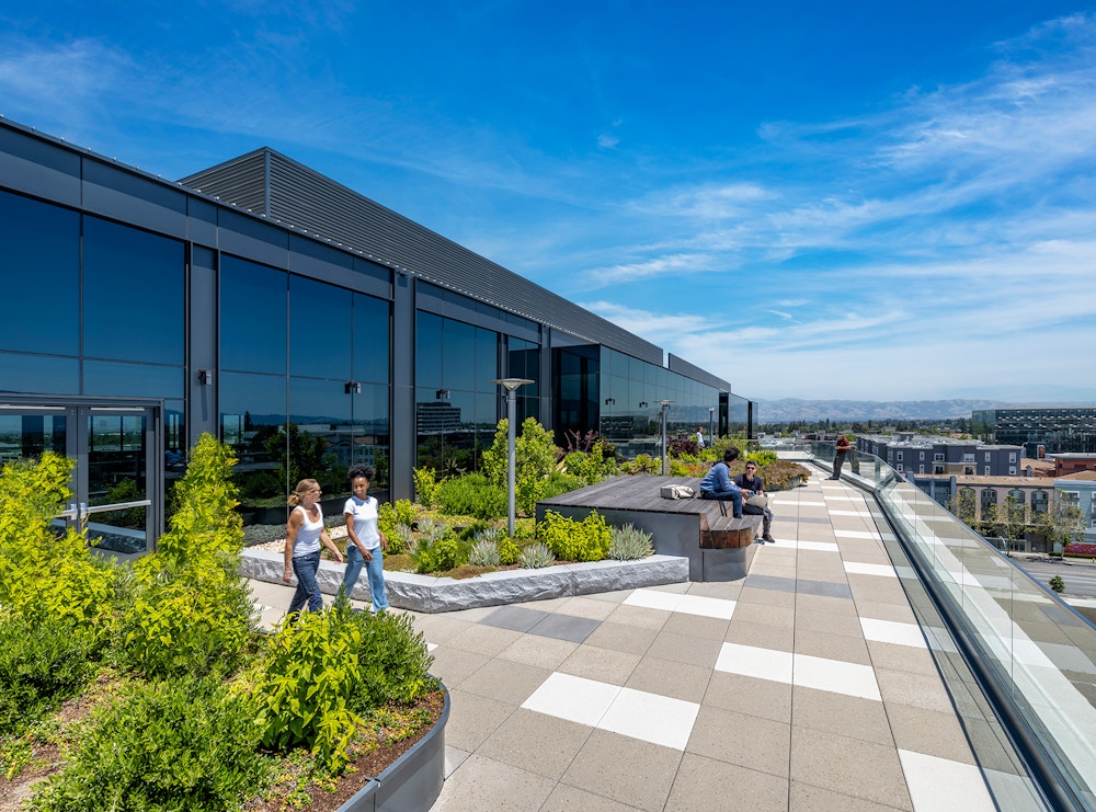 Terraces with integrated seating invite tenants to work and socialize outside. 