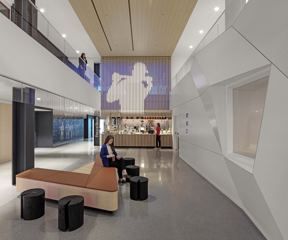 Just like the awe-inspiring stadiums, the aptly named Concourse connects people via a coffee bar at one end, stairs at either end, and both physical and visual connections to primary program elements.