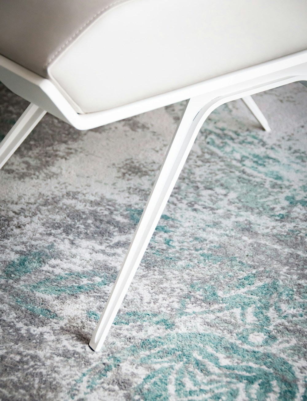 Carpet and footstool, close-up