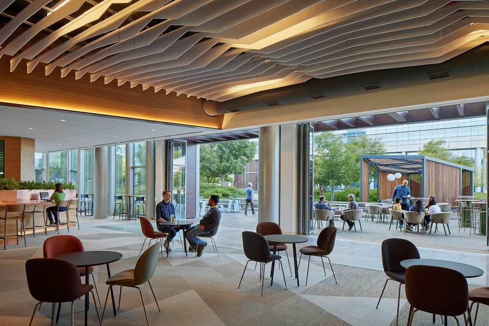 Natural daylight and indoor-outdoor connections are prioritized throughout this Fitwell 2 rated amenities building. Photo by Bruce Lamonte. 