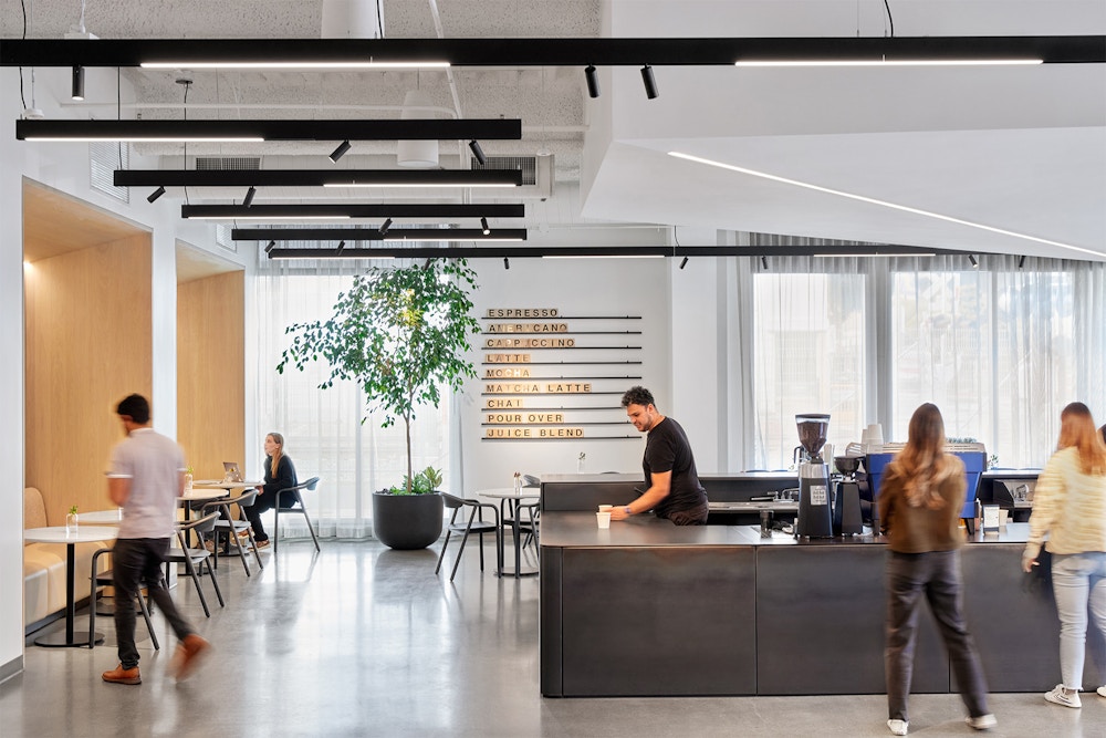 A full-serve espresso bar offers drinks for staff and guests.