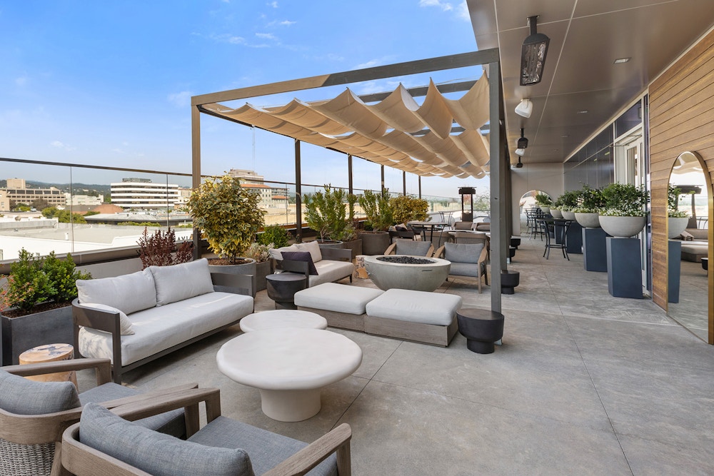 The rooftop terrace offers stunning views of the surrounding city. 