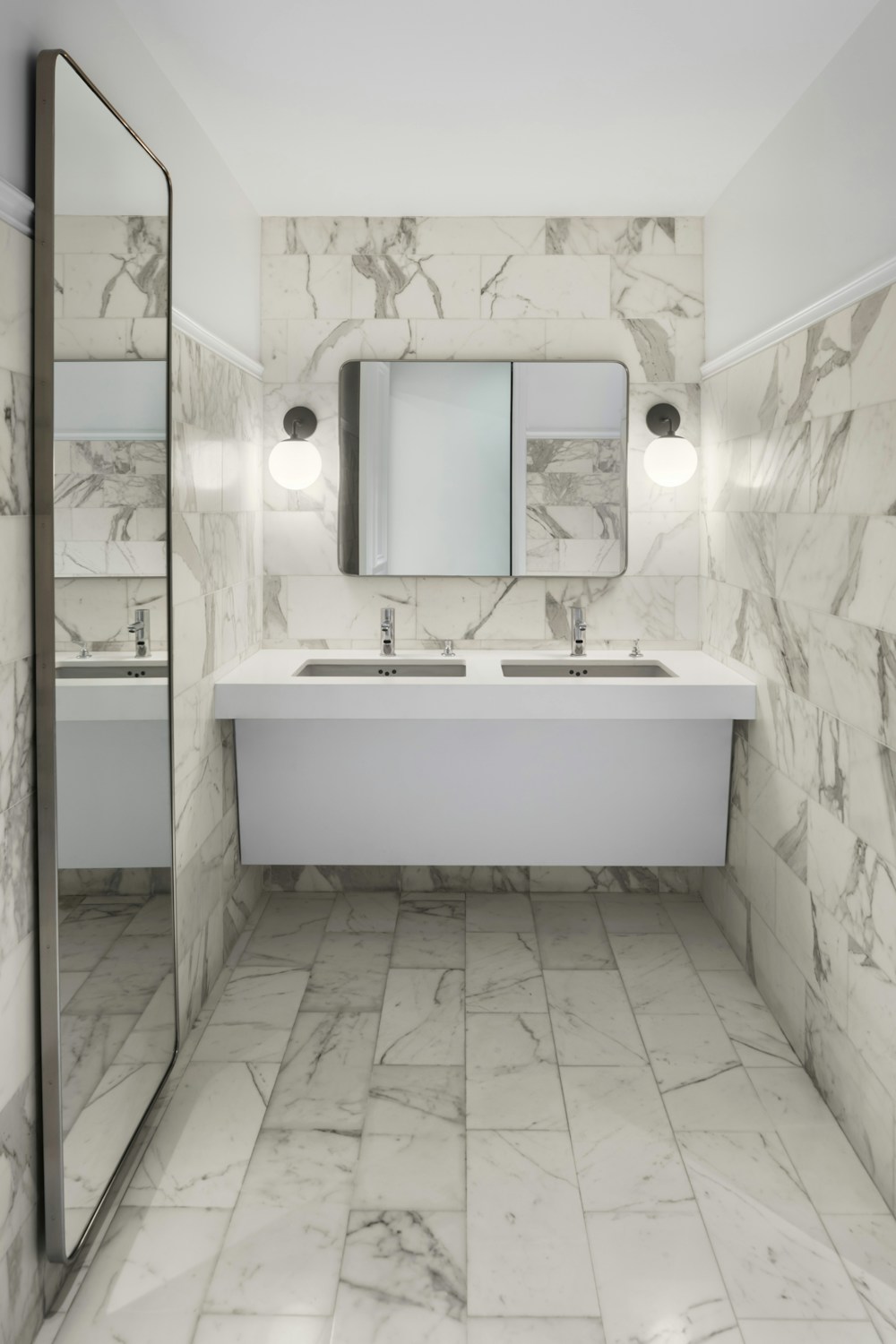 Restroom with existing marble