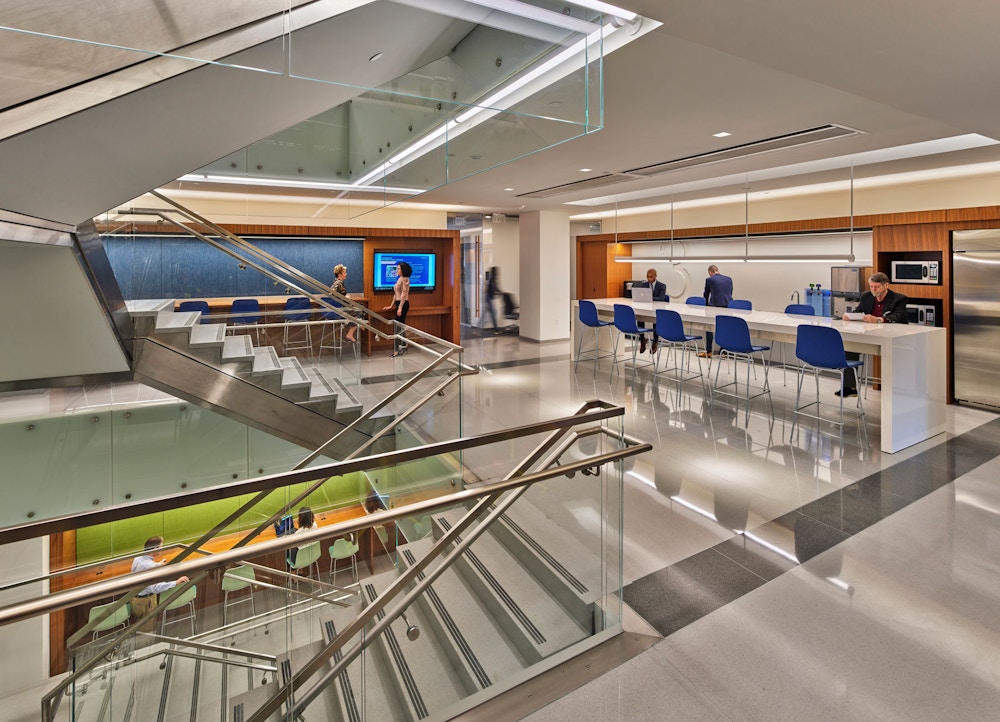 Collaboration café with interconnecting stair