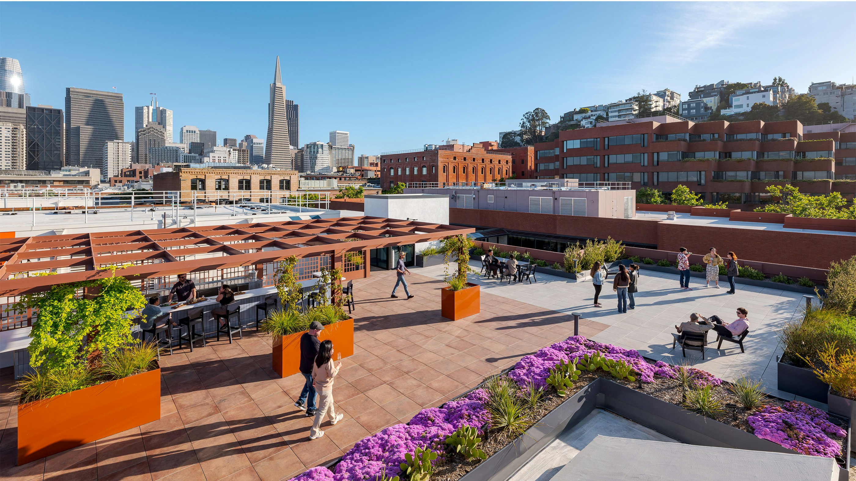 Ariel of Levi's Plaza with San Francisco skyline.