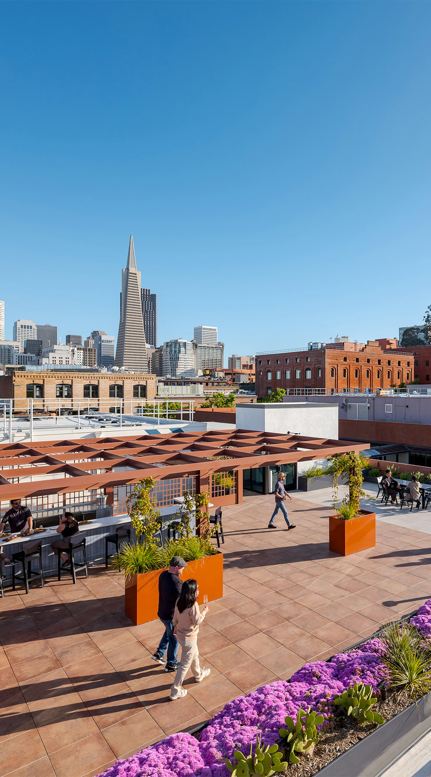 Ariel of Levi's Plaza with San Francisco skyline.