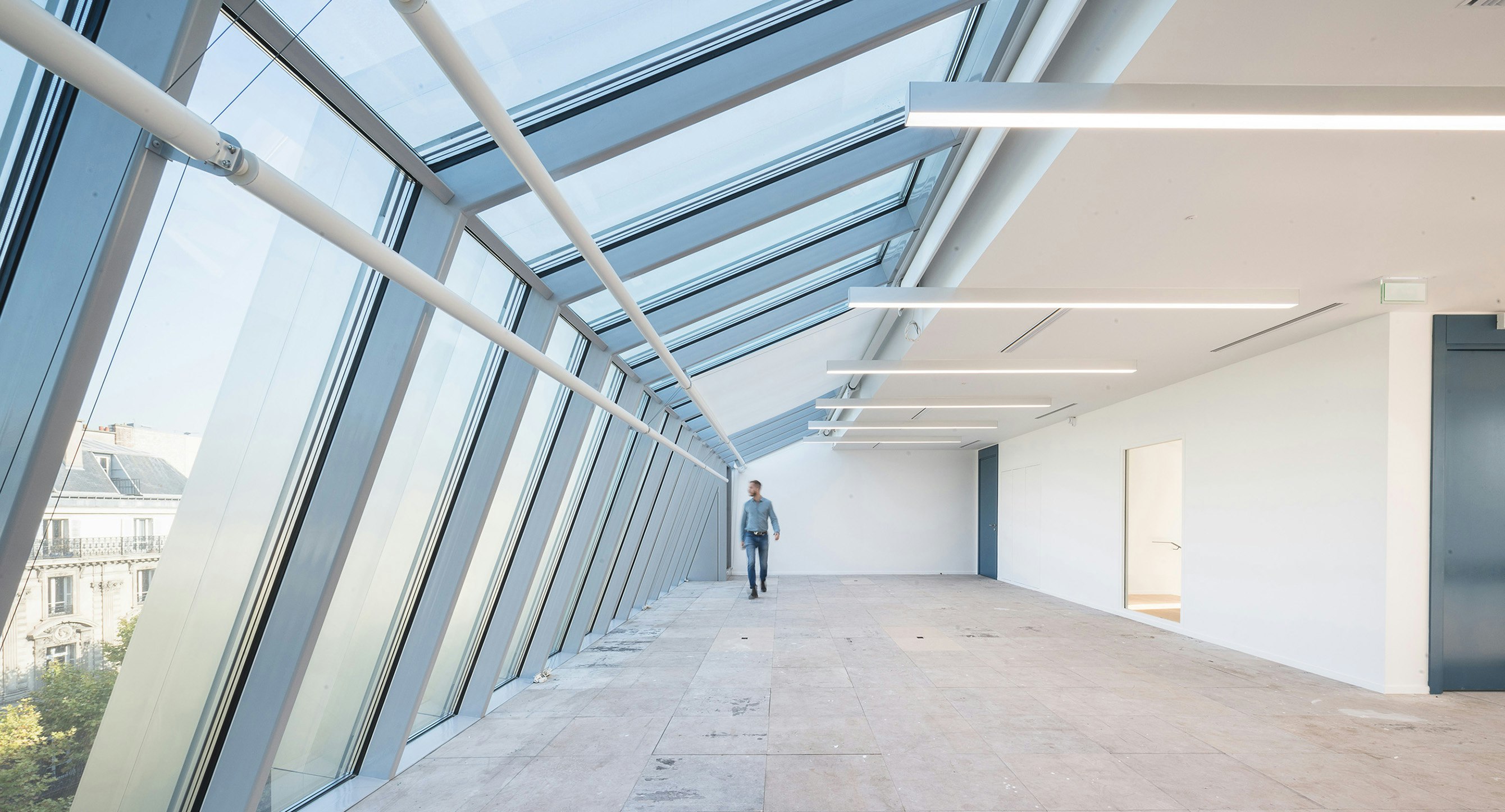 Office floor beneath the glass roof